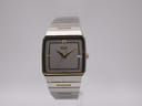 Front view of a Seiko 6532-5260 two-tone quartz watch with a grey square dial.