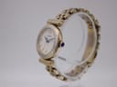 Side profile view of the elegant Seiko ladies' watch, showing the crown with a blue cabochon.