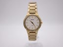 Front view of gold tone Seiko 7N00-0AP0 quartz watch with white dial and integrated bracelet on a white background.