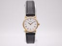 Front view of the Seiko 2Y00-0A10 quartz watch, showcasing its white dial with roman numerals and gold tone case.