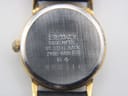 Close-up of the watch's stainless steel case back with Seiko branding, model 2Y00-0A10, and serial number 850316.