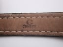 Detailed view of the black leather strap's underside, showing the 'Condor' brand stamp and stitching.