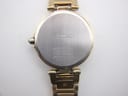 Detail of the gold tone steel bracelet and the signed Seiko folding clasp closure.
