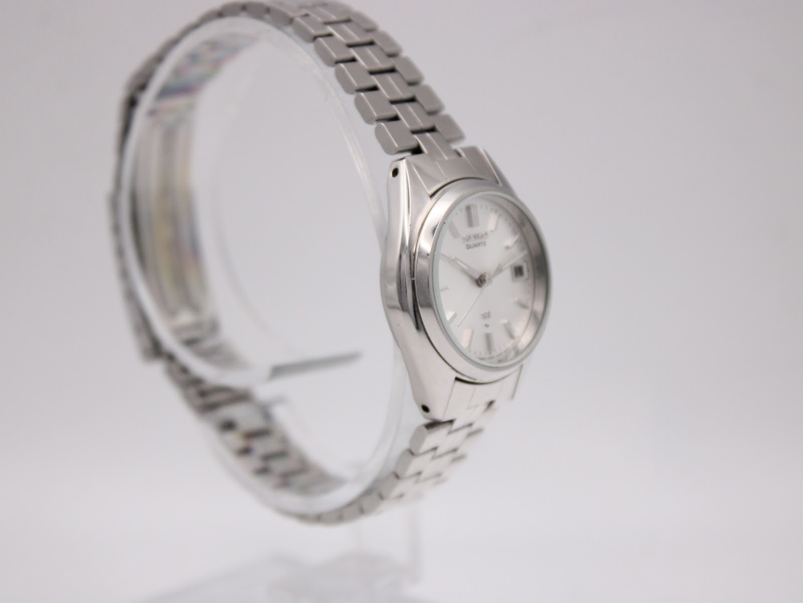 Close-up of the watch's stainless steel case back with Seiko markings and serial number.