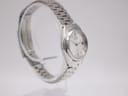 Close-up of the watch's stainless steel case back with Seiko markings and serial number.