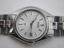 Detail shot of the integrated stainless steel bracelet and signed Seiko deployant clasp.