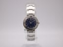 Front view of the Seiko 1N01 ladies' quartz watch with navy blue dial and stainless steel bracelet on a white background.