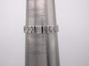 Close-up of the integrated stainless steel bracelet on a wrist sizing gauge, showing a circumference of 160mm.