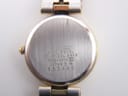 The gold Seiko watch being measured with digital callipers, showing a case diameter of 22.25mm.