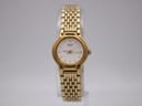 Front view of Seiko V401-0281 gold tone quartz watch with minimalist white dial.