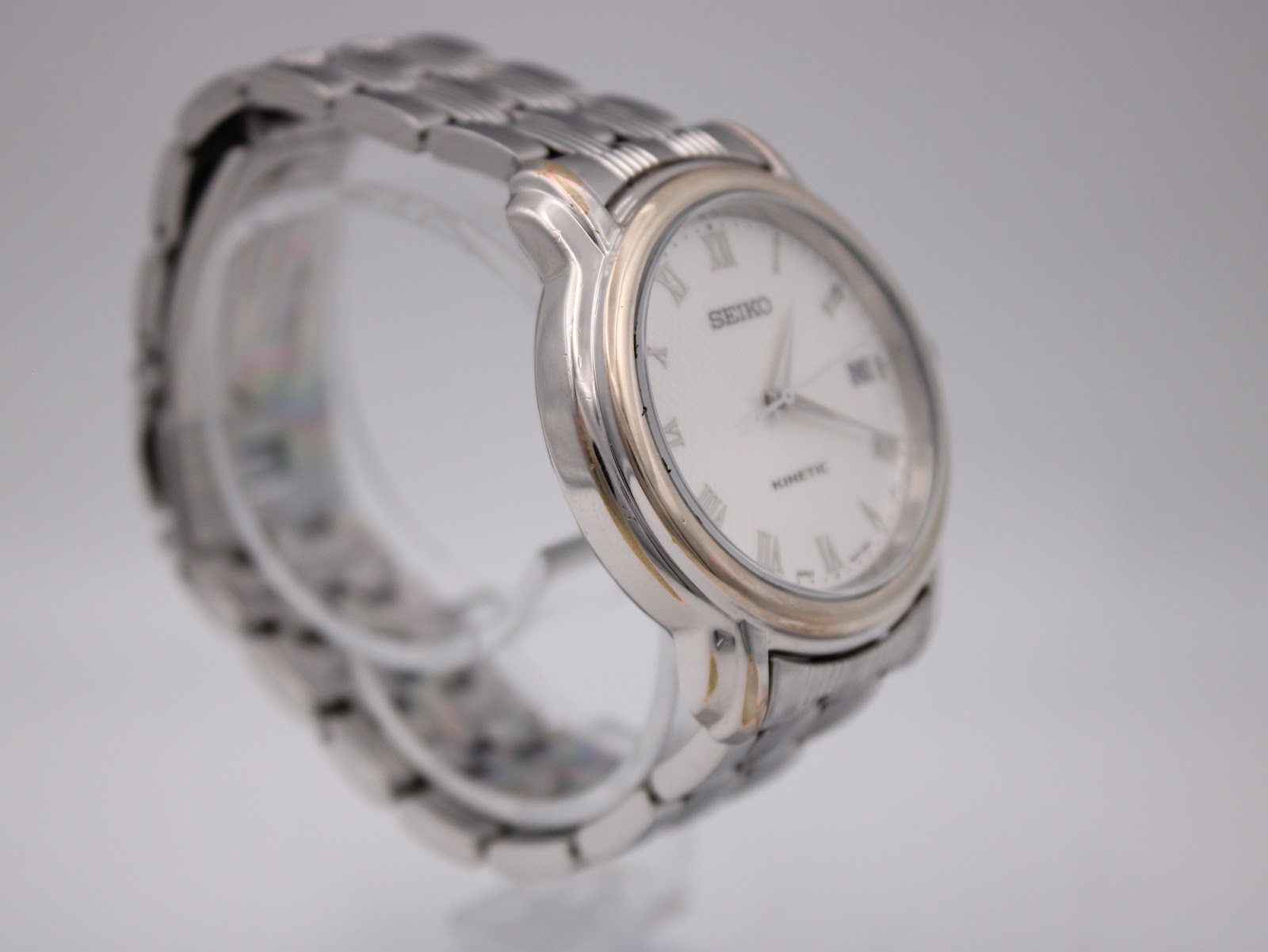 Side view of the Seiko Kinetic watch, showing the crown and case profile.