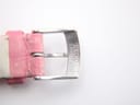Close-up of the stainless steel buckle, clearly engraved with 'SEIKO ST.STEEL' on the pink leather strap.