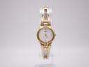 Front view of the Seiko 1N00-0GN0 gold-tone ladies' quartz watch with mother of pearl dial and bangle bracelet.