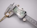 Digital caliper measuring the case diameter of the Seiko watch, showing a precise measurement of 19.52mm.