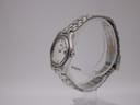 Side profile view of the Seiko 7N89-0021 watch case and integrated bracelet.