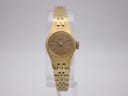Front view of vintage Seiko 1100-1460 gold ladies' manual wind watch with textured case and bracelet