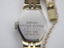 Back view of the Seiko watch, showing the stainless steel case back with serial number and model information