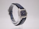 Close-up of the watch's navy blue textured leather strap and classic silver-tone buckle.