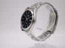 Side profile of the vintage Seiko watch showing the angular case shape and integrated bracelet.