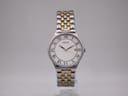 Front view of the Seiko 7N32-0EB0 two-tone watch with a white Roman numeral dial.
