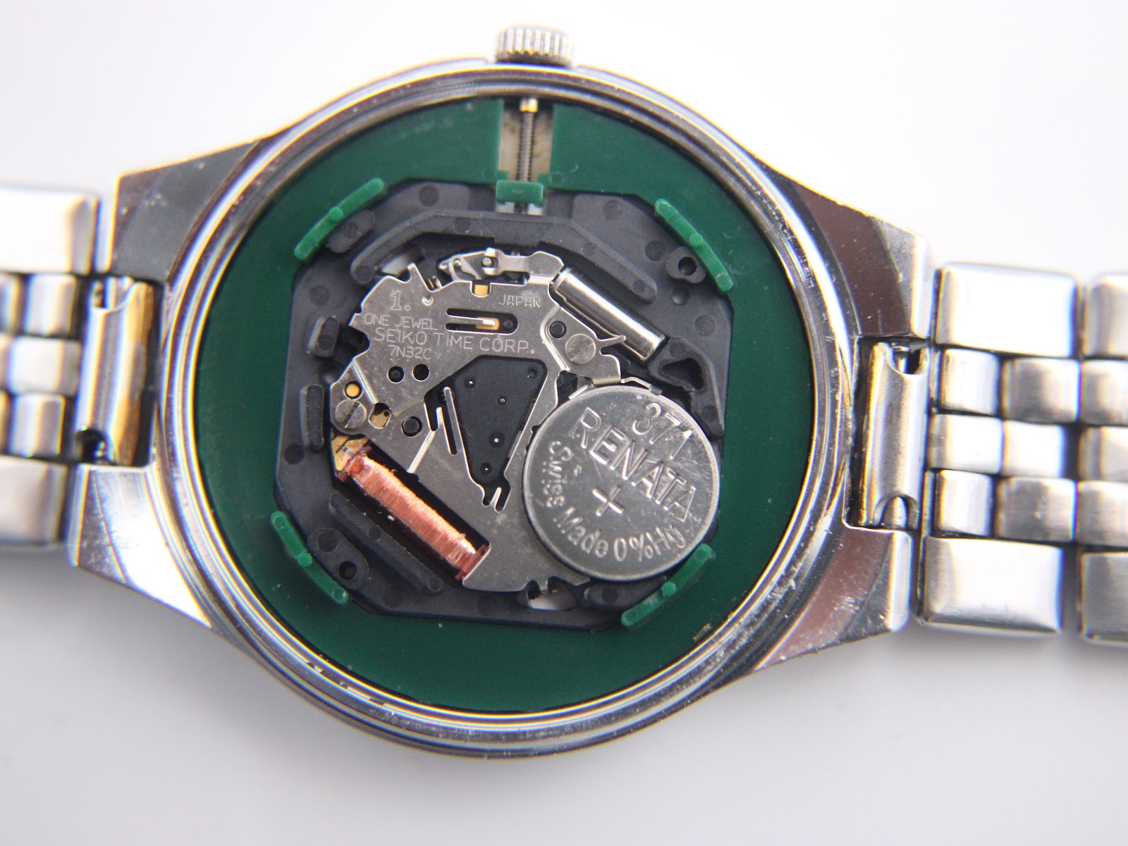 Rear view of the Seiko 7N32-0EB0 case back, showing the model and serial numbers.