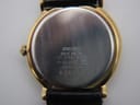 Close-up of the stainless steel case back, engraved with 'SEIKO BASE METAL ST. STEEL BACK 5Y32-6A20 JAPAN MS 050319'.