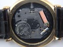 Macro shot of the Seiko quartz movement with a Renata 370 battery, showing the internal mechanics.