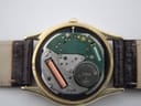 Detailed view of the Seiko 8223A quartz movement inside the watch, with battery and jewels visible.