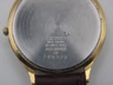 Close-up of the stainless steel case back, showing Seiko branding, model number 5Y39-8060, serial number 140328, and 'base metal' inscription.