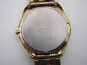 Close-up of the stainless steel case back, showing Seiko branding, model number V743-8069, and serial number 8N4454.