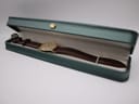 The Seiko 7122-7000 watch presented neatly inside a green hinged display box with a cream interior.