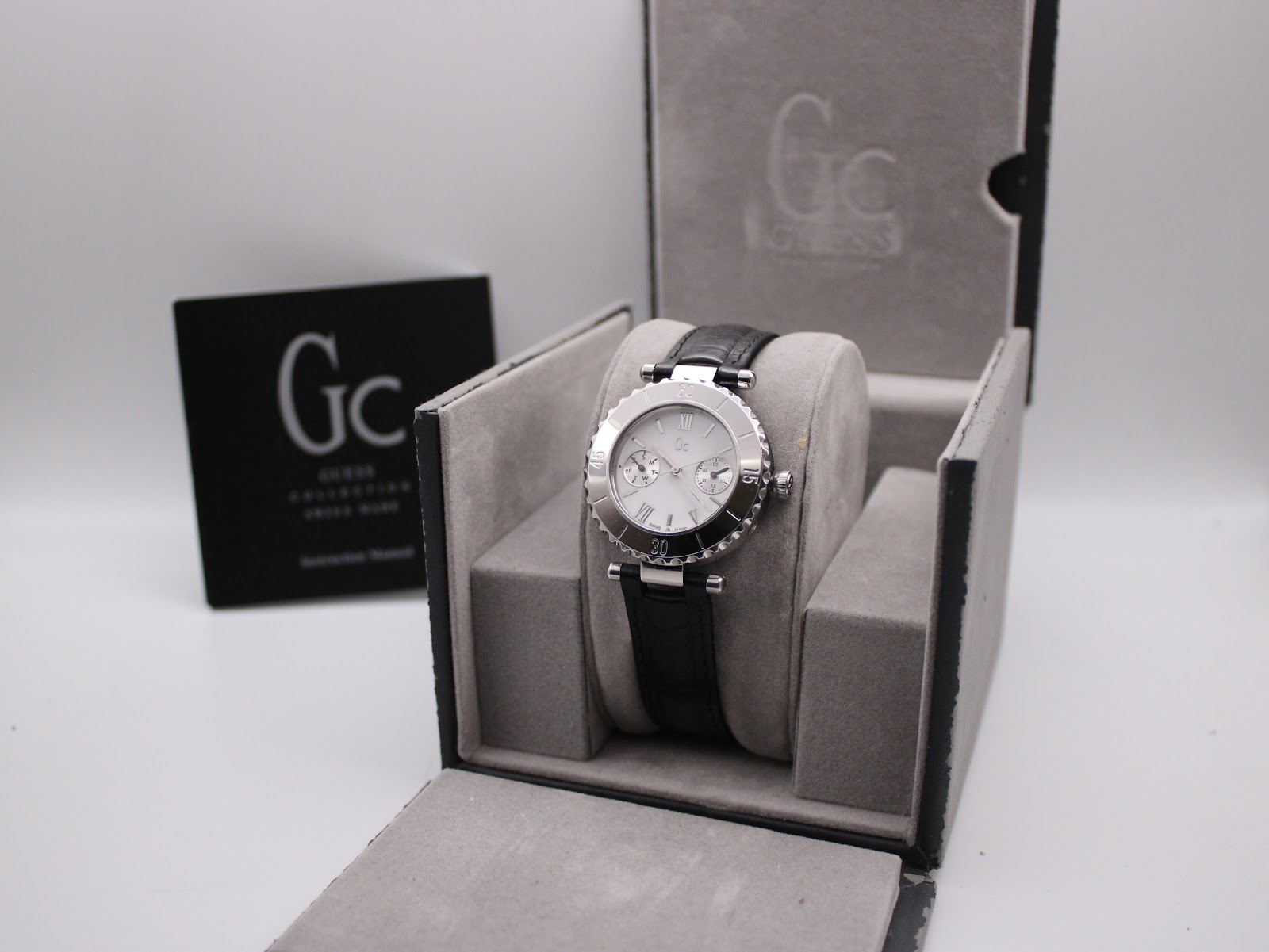 Front view of the Gc Guess Collection 14014L watch showing white multi-function dial with Roman numerals.