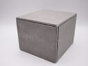 Closed view of the grey Gc watch box from the top corner.