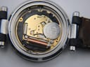 Open case back showing the Swiss Ronda quartz movement and Renata 371 battery.