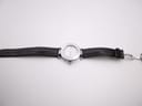 Full length view of the Gc watch with black leather strap and deployant clasp unfastened.