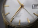 Macro close-up of the silver dial showing '17 JEWELS', the Seiko 'S' logo, and minor marks on the dial and crystal.