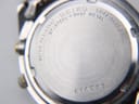 Close-up of the Seiko watch's stainless steel case back, showing "SEIKO", "5M42-0B80", "WATER RESISTANT", and serial number "616573".
