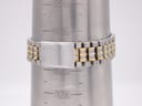 Close-up of the two-tone stainless steel bracelet with signed Seiko clasp on a wrist sizing gauge, indicating a maximum wrist size of approximately 20cm.