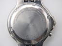 Close-up of the watch case back, showing "SEIKO 5M42-0A50 WATER RESISTANT SAPPHIRE CRYSTAL STAINLESS STEEL JAPAN 578119".