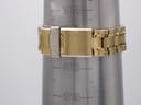 Close-up of the gold-tone Seiko deployant clasp on a wrist sizing cone, showing a wrist size of 165mm.