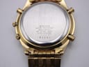 Close-up of the watch case back, showing "SEIKO WATER RESISTANT BASE METAL ST. STEEL BACK 5T52-7A2A A4 JAPAN D 180284".