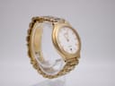 Reverse angled view of the gold-toned Seiko quartz watch, highlighting the case profile and bracelet links.