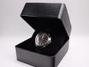 Seiko Kinetic watch displayed inside a generic black presentation box.