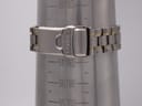The signed Seiko two-tone deployant clasp of the bracelet, resting on a wrist sizing cone at 6.0 inches / 18.3 cm.