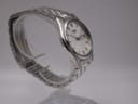 Another angled side view of the Seiko watch, highlighting the polished bezel and brushed case sides.