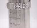 Close-up of the Seiko stainless steel jubilee bracelet clasp on a wrist sizing gauge, showing 198mm circumference.
