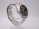 Another angled side view of the Seiko watch, highlighting the brushed and polished finish of the case.