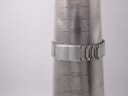 The stainless steel bracelet of the Seiko watch on a wrist sizing gauge, indicating a maximum wrist circumference of 185mm / 18.5cm, with the signed "SEIKO" clasp visible.