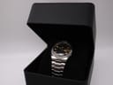 The Seiko watch presented in a generic black watch box, offering a general view of its appearance.