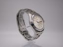 Opposite angled side view of the Seiko watch, highlighting the two-tone bracelet.